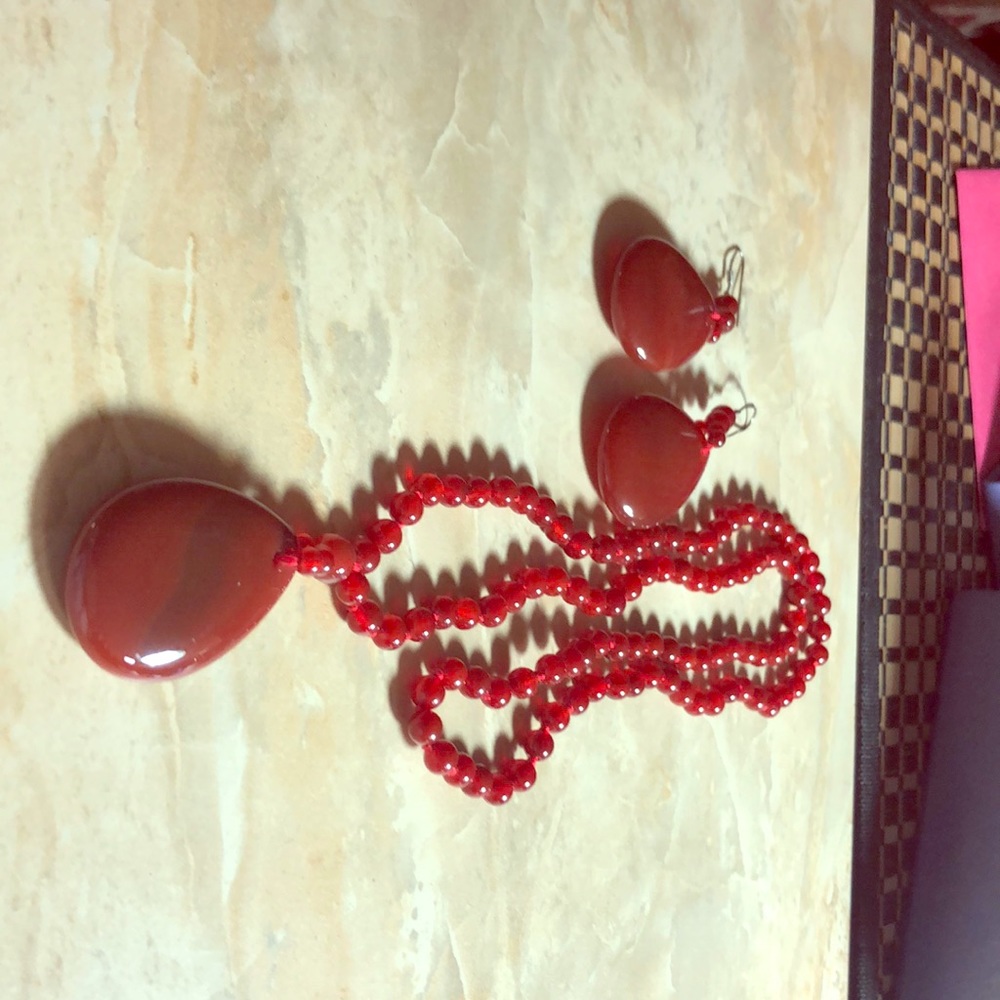 Two sets of beaded necklaces and earrings